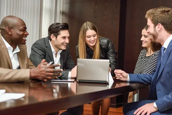 co workers discussing last financial analysis